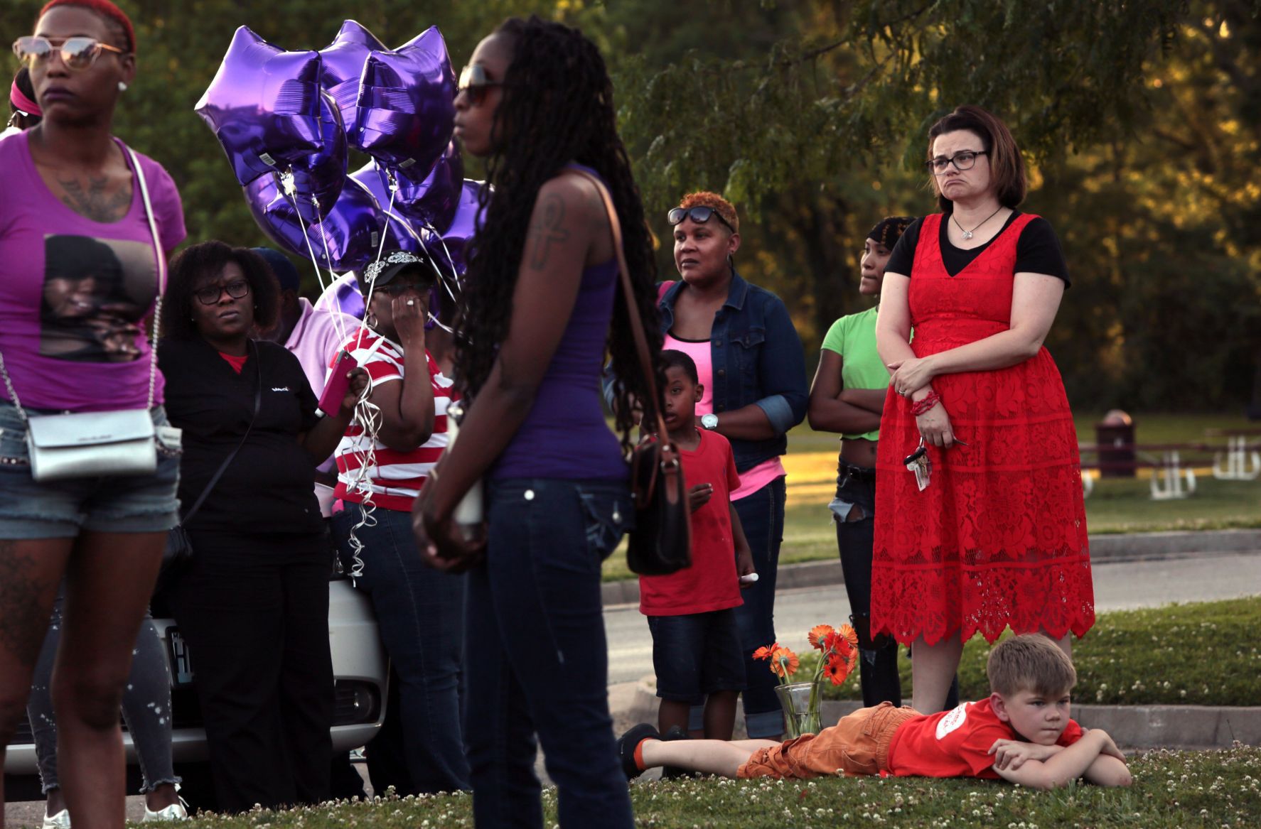 Vigil held for victims of triple fatal shooting, wounding of 7-year-old
